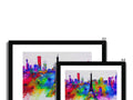 A colorful scene of three art prints with a city skyline around it