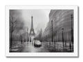 A large black and white picture of a street in Paris.