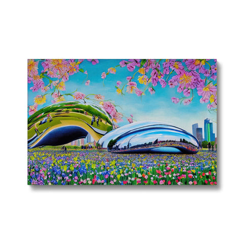 A colorful greeting card on a metal table with a mouse pad.