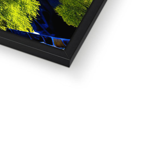 Picture frame on top of a display on a computer screen.