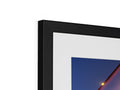 a picture frame with a close up of a white monitor and some frames