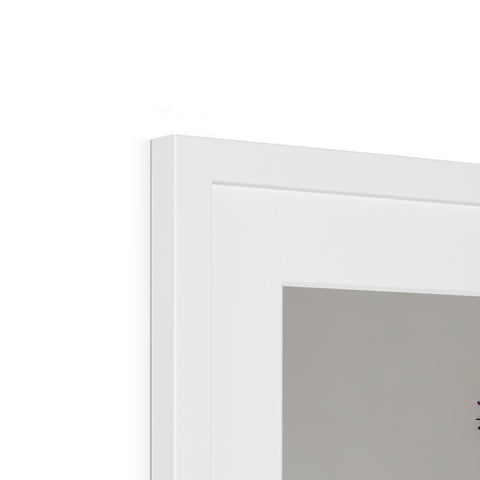 A white framed clock is holding a light switch on top of a bathroom door frame.