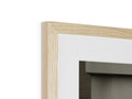 a picture frame with a wooden counter made of wood in a white room.
