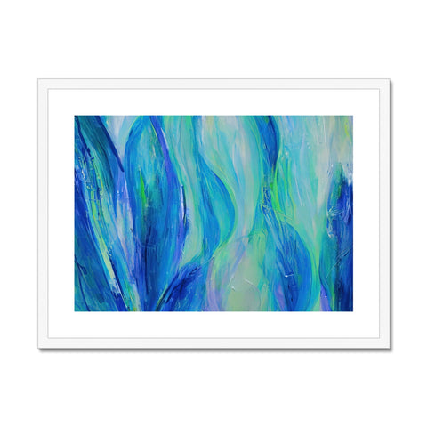 An art print depicting colorful waves in the ocean sitting next to a white bench