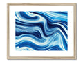 A painted illustration of ocean waves on a wooden frame next to a white background.