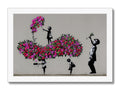 An art print of a flower arrangement is sprayed on a tree.