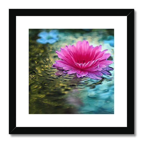 a pink flower on a wooden frame with water lilies