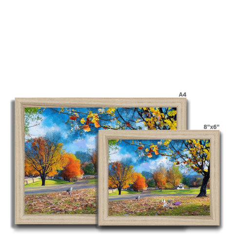A scene with three images of autumn trees set on white pictures frames.
