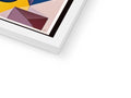 A large picture of a photo frame is on a table with colorful paint