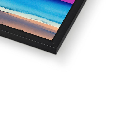 a framed picture of the rainbow on a picture frame that is in a room