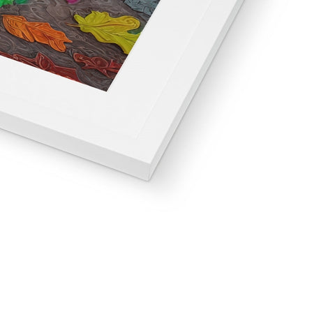 A colorful framed photo of an art print hanging on a wall.