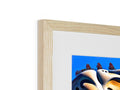 A 3D picture hanging on a large wooden frame is a picture of 3 white birds