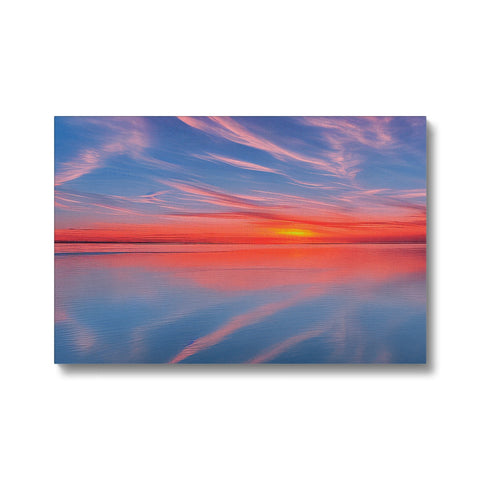 A large photo of a sunset on a colorful card with a lake in the background.