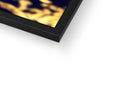 A close up of a golden ring of gold wrapping wrapped closely together on a photo frame