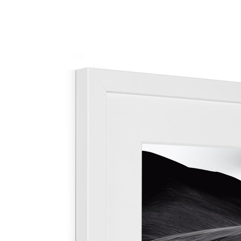 A picture frame with a window with a white background.