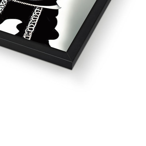 a picture frame next to a picture hanging onto the wall, white background, black image