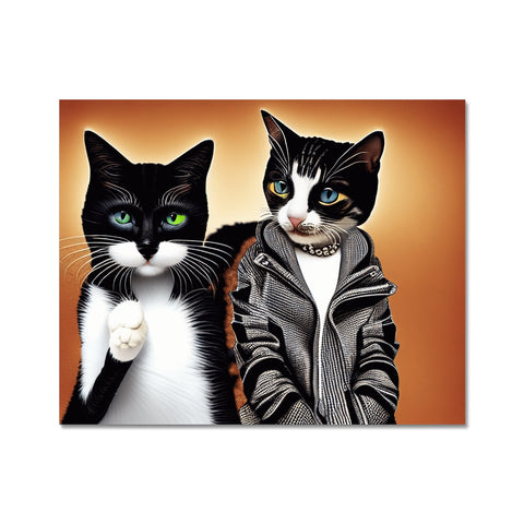 A couple of lit up cats are sitting on a pair of place mats.