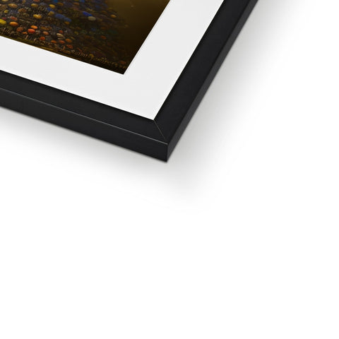 An up close look at a photograph frame with a black mirror to it.