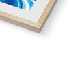 A picture frame is sitting on top of a wooden frame with a blue background.
