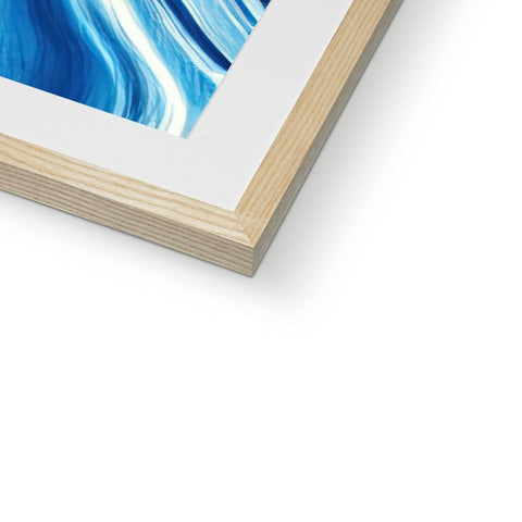 A picture frame is sitting on top of a wooden frame with a blue background.