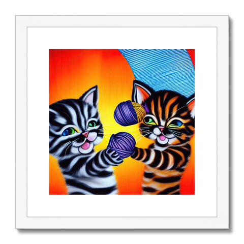 A pair of kittens hugging each other in front of an art print.