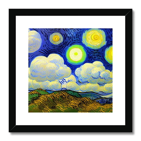 An art print sits next to a sunset in a blue sky overlooking a hillside.