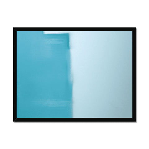 The picture is looking at a television in front of a glass wall with glass frames.