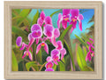 A picture of a purple and pink orchid on a wooden framed frame