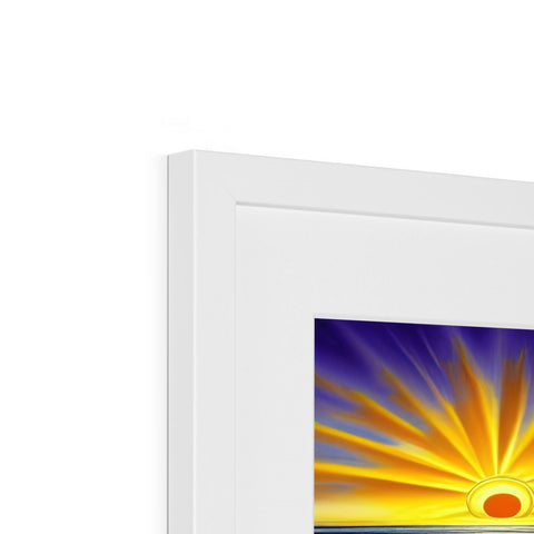 A picture frame with a picture of sunrise in a window with a sunburst scene on