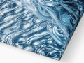 Wavy water covered with water in a ceramic tile floor on top of a table.