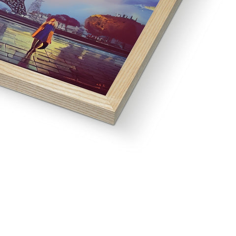 A picture of a photo on a wooden frame framed with a softcover book with several