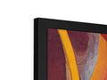 An abstract painting on a painting easel displayed on flat screen tv.