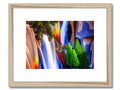 An art print has a picture of the Blue Nile with colorful waterfalls and people standing
