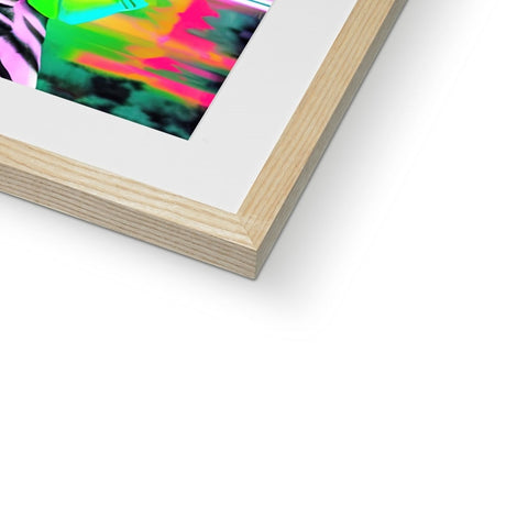 A framed image of green light from a picture frame with an abstract painting on the top