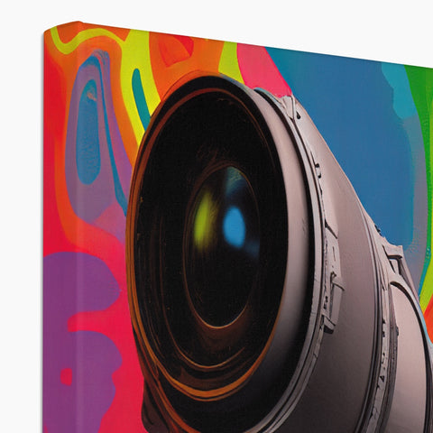 A computer with a colorful canvas print of graffiti in a book.