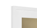 A picture frame containing a framed image on a white picture on top of a wall.