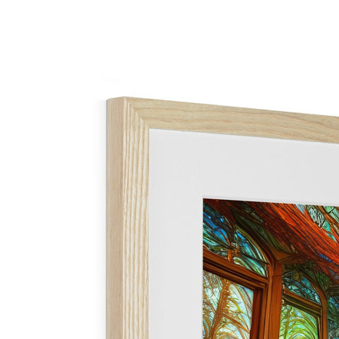 A wood framed photo on a photo frame, is on top of some glass frames.