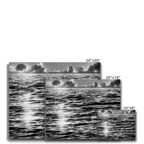 A pair of blurry images together are shown in a watery, cloudy image.