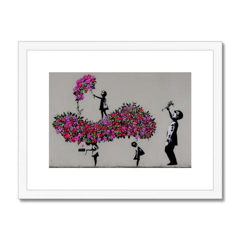 Art print on a wall and flowers