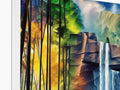 A colorful art print of the waterfalls with mountains of trees in the background.