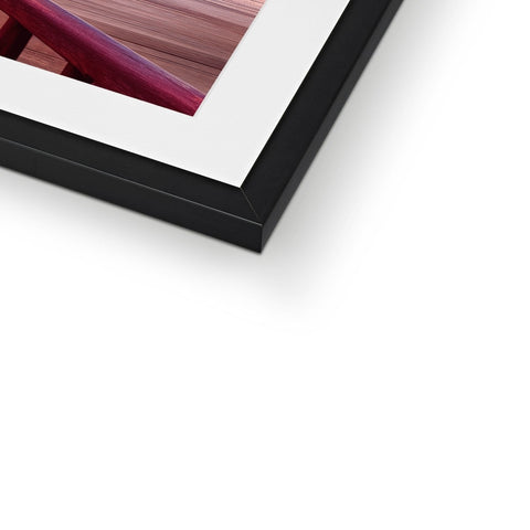 A close up photograph of a picture frame containing a wooden frame.
