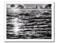 A black and white picture of a picture of the waves on the ocean.
