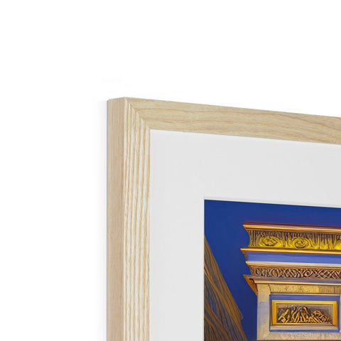 a picture frame standing on top of an antique fireplace with a blue and white picture frame