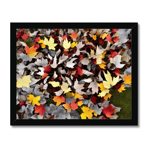 A leaf covered blanket that is covered in many different kinds of leaves.
