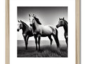 a black and white blurred picture of horses that have been crossing in the field.