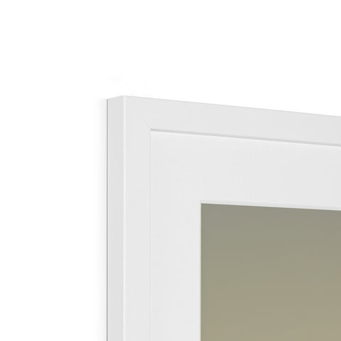 A picture frame of a window on a white wall with a picture frame on a small