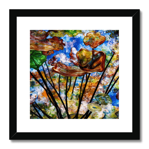 An art print with red bird wings and a parachute on one branch.