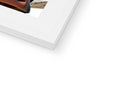 There is an orange photo with an ipad next to a paper photo book labeled "