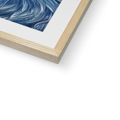 An art print picture in a blue frame on a wooden wall next to the wall.