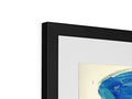 A photo of an abstract art print framed in blue and white art in a frame.